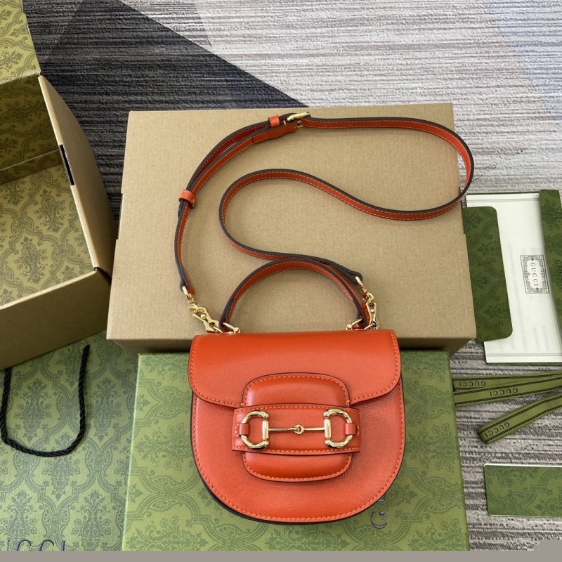 G*u*i top handle bags